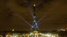 La Torre Eiffel se ilumina en el marco de la cumbre climática COP21