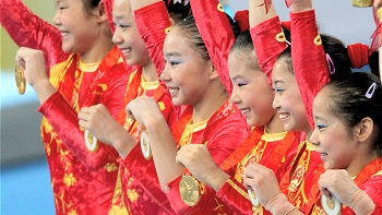   China monopolizó la gimnasia artística por equipos en los JJ.OO. 