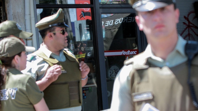 Formalizan a mujer que disparó e hirió a guardia en sucursal de BancoEstado
