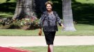 Rousseff bajó en sondeos, pero aún podría ganar elecciones en primera vuelta