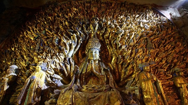 Concluye restauración de famoso buda de las mil manos tras 7 años de trabajos