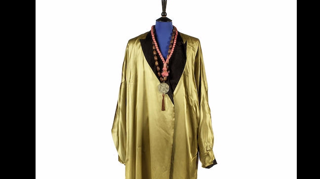 Subastan trajes y manuscritos de las canciones de Robbie Williams