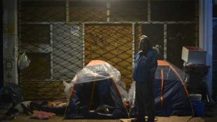   Personas en situación de calle en medio del sistema frontal 