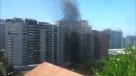 Incendio se registra en edificio de Santiago