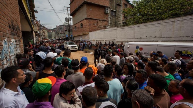 Gobierno venezolano elevó a 12 los muertos tras disturbios en el oeste de Caracas