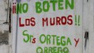 Vecinos de La Legua rechazaron con rayados demolición de muros