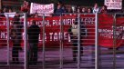 Vecinos de Puente Alto y Maipú protestaron antes del debate presidencial