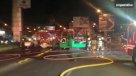 El trabajo de Bomberos tras quema de bus del Transantiago en la Alameda