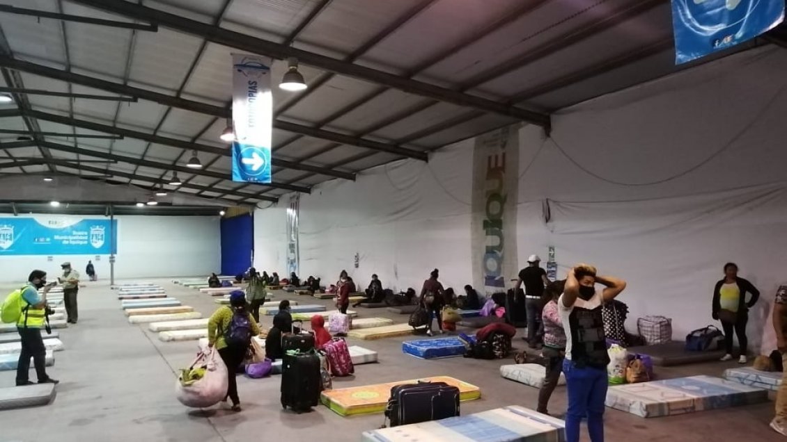 Residencia sanitaria para migrantes llega a su límite en Iquique y piden ampliar su capacidad