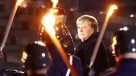  El Ejército alemán despidió a Merkel con honores, antorchas, rosas rojas y al ritmo de la cantante punk Nina Hagen 