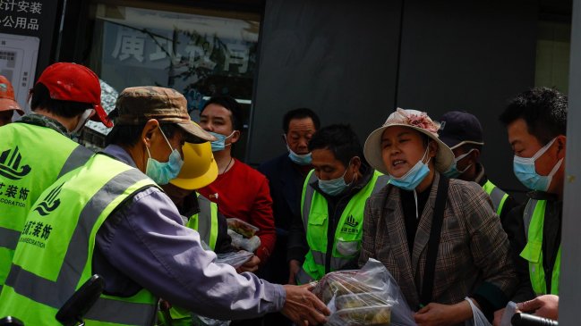 Comprar comida, una odisea en el confinamiento de la ciudad más rica de China