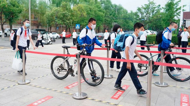 China amplía cobertura de educación secundaria