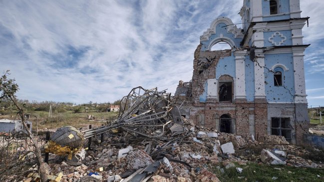 Ucranianos encuentran otros 12 cuerpos de civiles tras liberar poblaciones