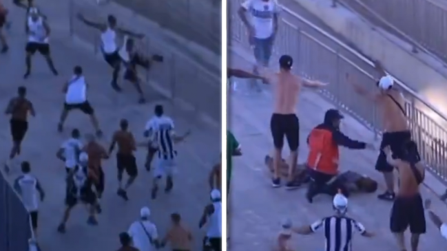 [VIDEO] Violenta pelea entre hinchas de Fluminense y Atlético Mineiro dejó un herido de urgencia