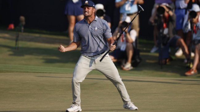 Golf: DeChambeau resistió el asedio de McIlroy y conquistó el Abierto de EE.UU.