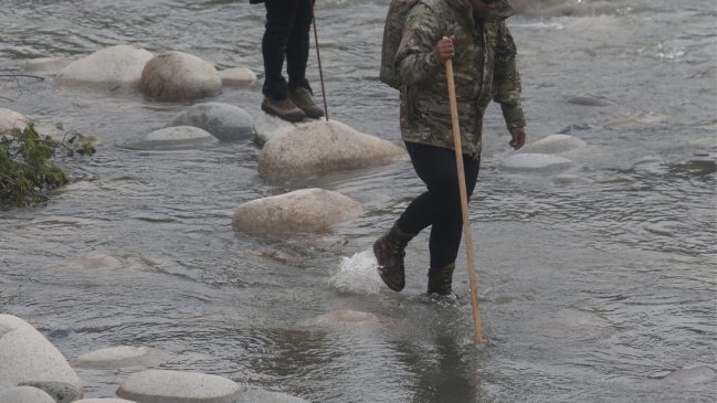 Familiares de víctimas arrastradas por el río en 