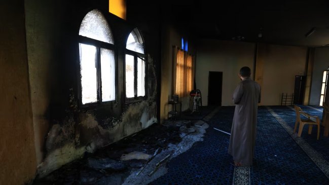 Israeli settlers burn two Palestinian mosques in West Bank attacks